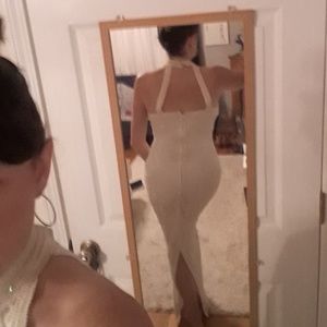 Fitted sleeveless Pearl beaded gown.